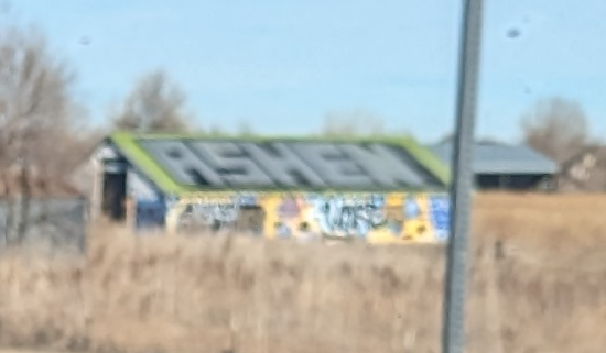 outbuildings covered in graffiti